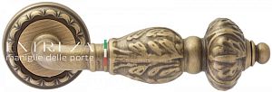 Дверная ручка Extreza TESLA (Тесла) 315 на розетке R02 матовая бронза F03; ?>