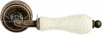 Дверная ручка Extreza DANA CRACKLE (Дана кракле) 306 на розетке R01 античная бронза F23