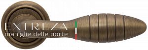 Дверная ручка Extreza MIREL (Мирел) 316 на розетке R01 матовая бронза F03; ?>